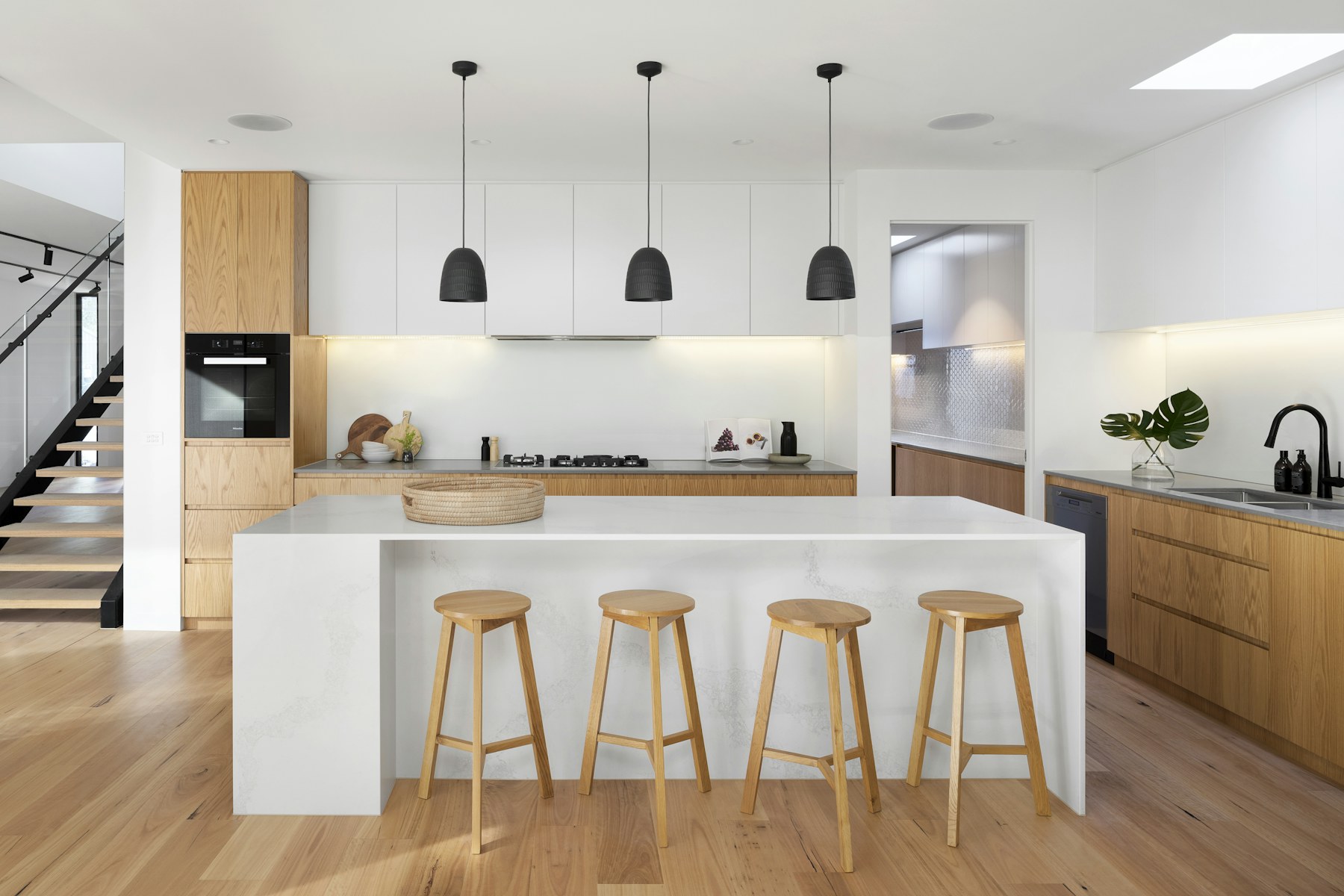 Warm fitted kitchen and coordinated interior used as project inspiration